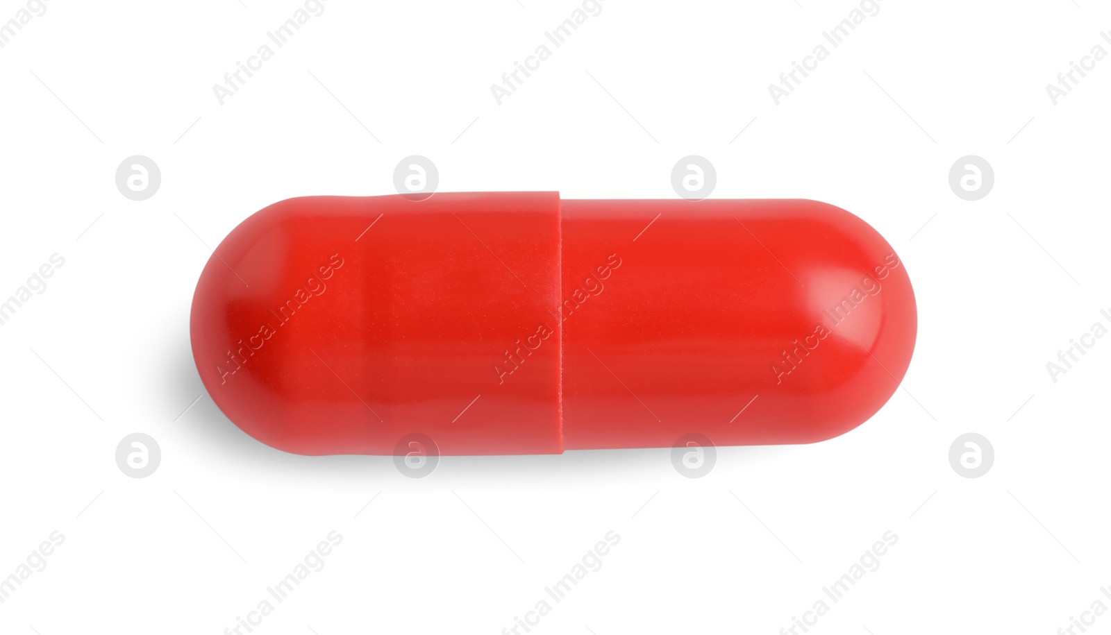 Photo of One pill isolated on white, top view