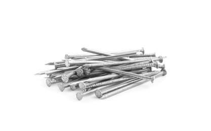 Photo of Pile of metal nails on white background