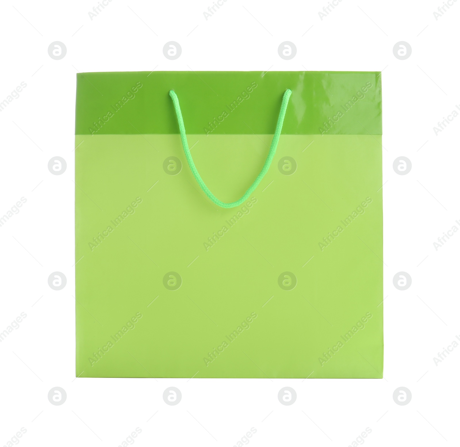 Photo of Green paper shopping bag isolated on white