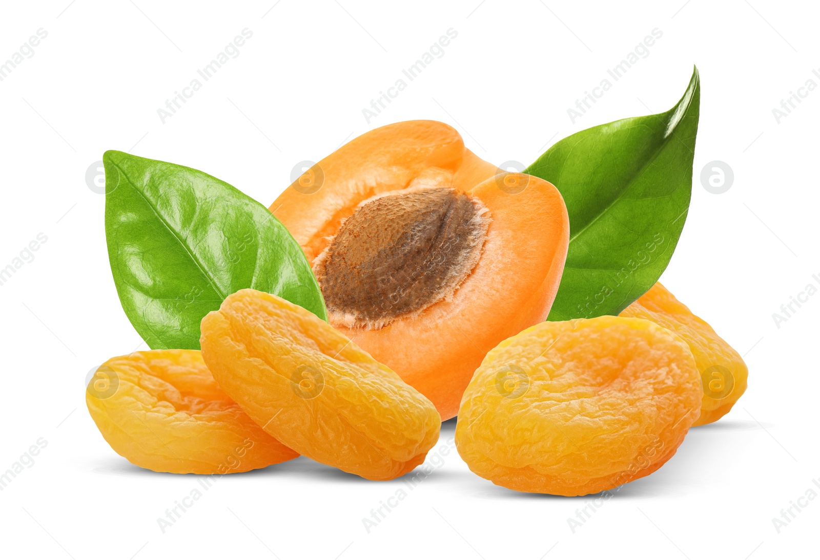 Image of Tasty dried apricots and fresh one with green leaves on white background