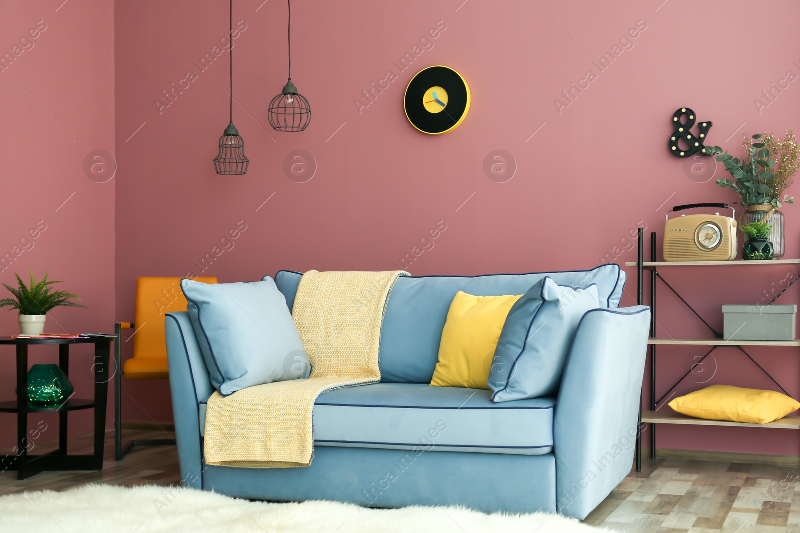 Photo of Cozy living room interior with comfortable sofa