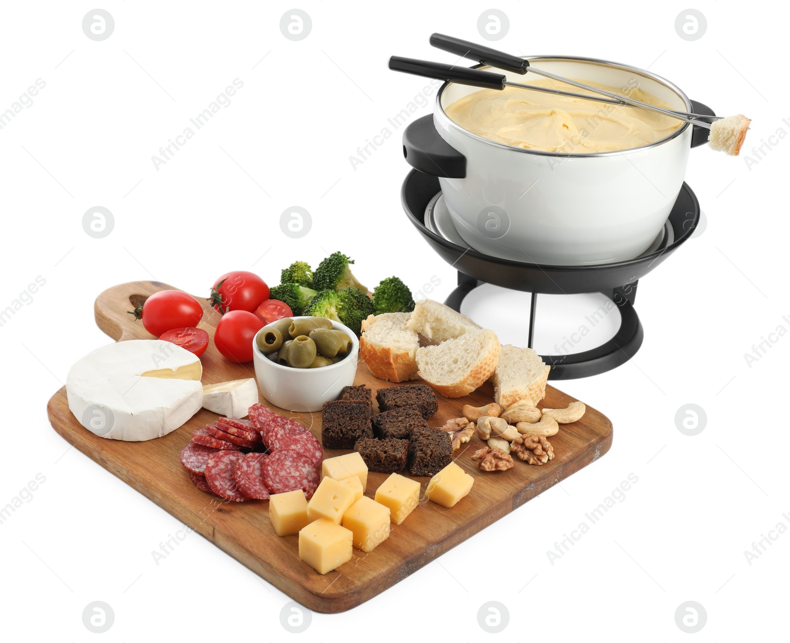 Photo of Fondue with tasty melted cheese, forks and different snacks isolated on white