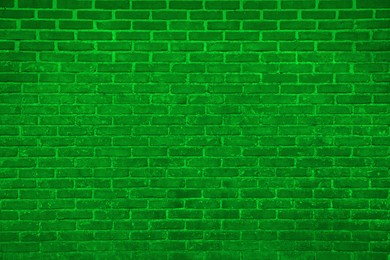 Image of Texture of bright green brick wall as background