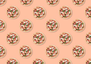 Image of Many delicious pizzas on pink background, flat lay. Seamless pattern design