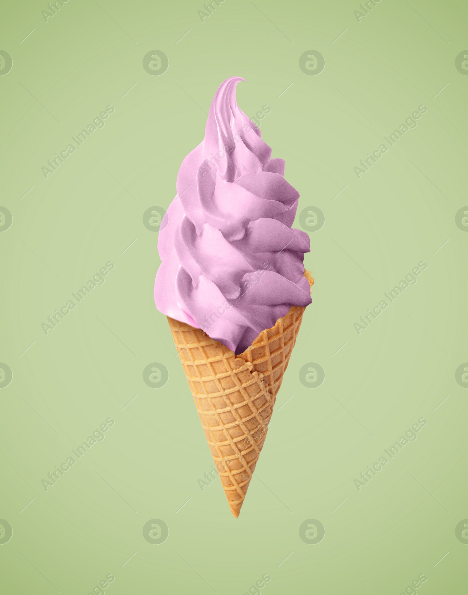 Image of Delicious soft serve berry ice cream in crispy cone on pastel olive background