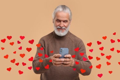 Long distance love. Man chatting with sweetheart via smartphone on dark beige background. Hearts flying out of device and swirling around him