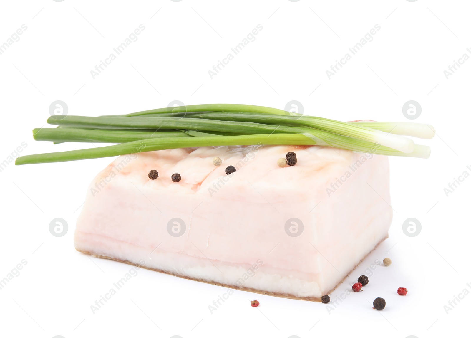 Photo of Piece of pork fatback with pepper and onions isolated on white