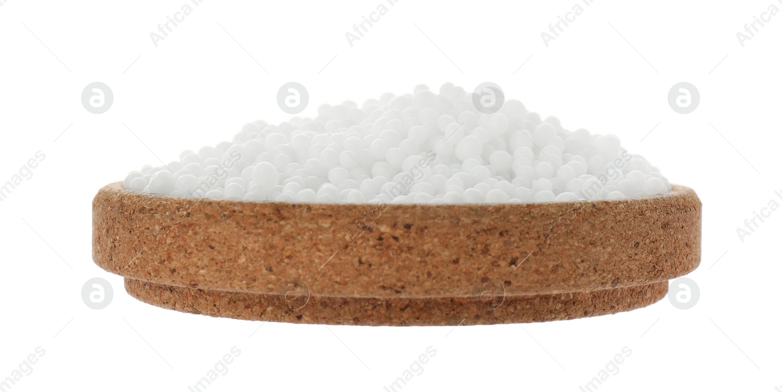 Photo of Pellets of ammonium nitrate isolated on white. Mineral fertilizer