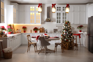Stylish kitchen interior with beautiful Christmas decor