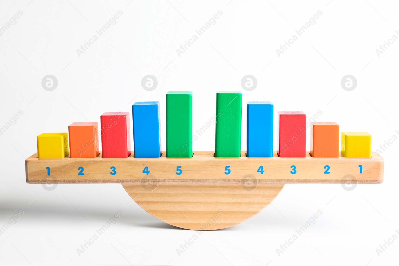Photo of Wooden scale with colorful blocks isolated on white. Montessori toy
