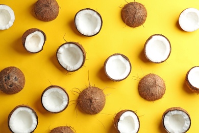 Coconut pattern on color background, flat lay