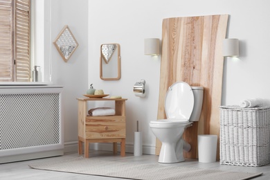 Photo of Toilet bowl in modern bathroom interior