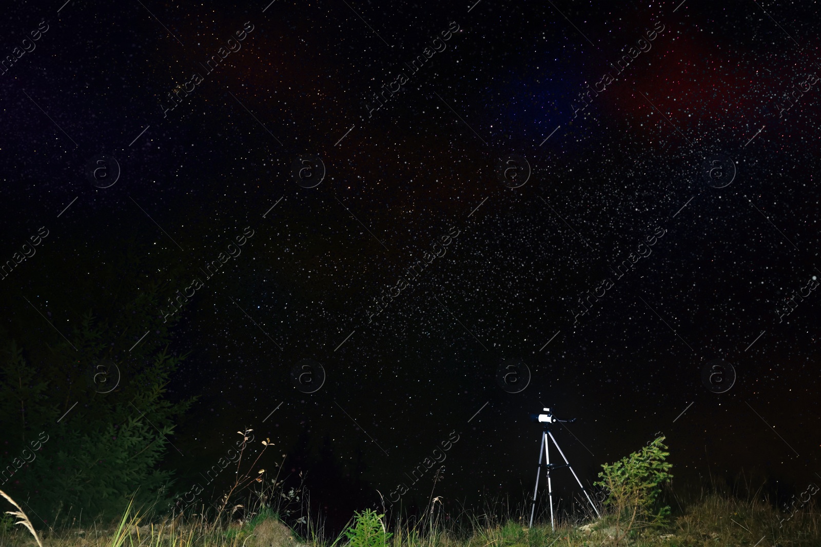 Photo of Modern telescope and beautiful sky in night outdoors. Learning astronomy