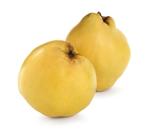 Photo of Delicious ripe fresh quinces on white background