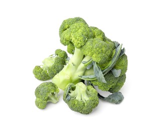 Photo of Pile of fresh raw green broccoli isolated on white