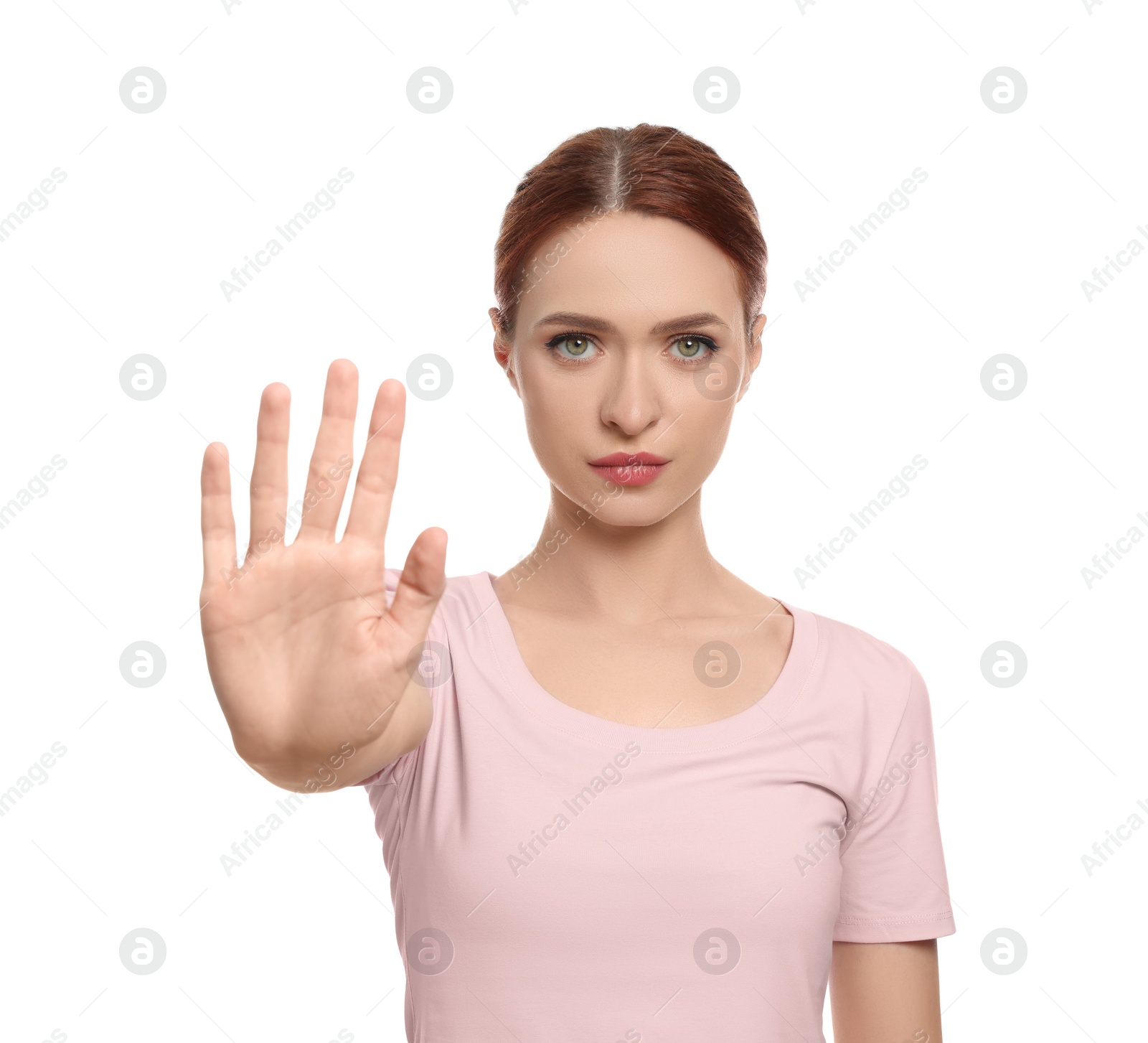 Photo of Woman showing stop gesture on white background