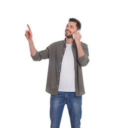 Photo of Man talking on phone against white background