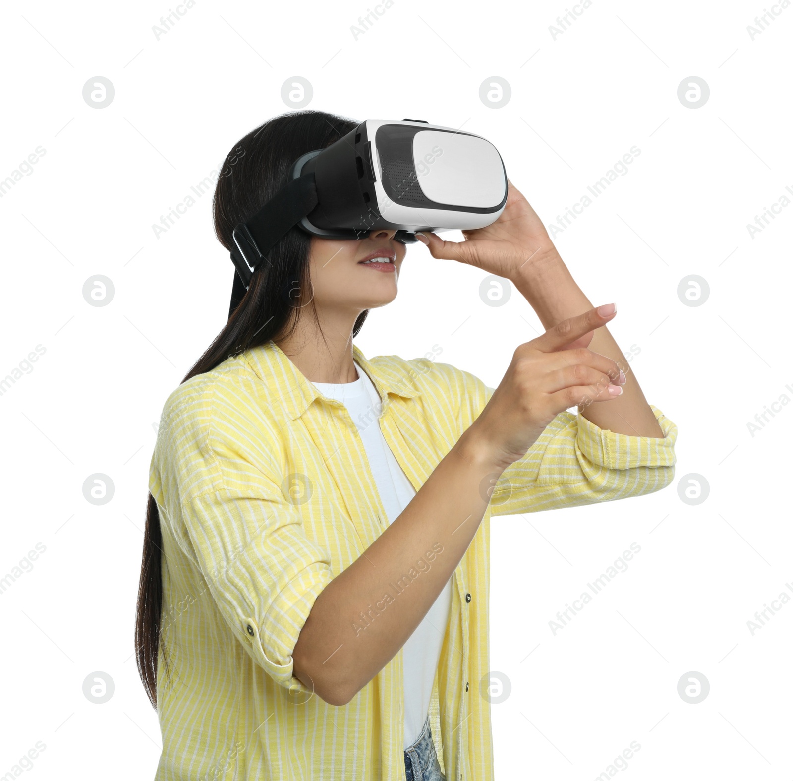 Photo of Woman using virtual reality headset on white background