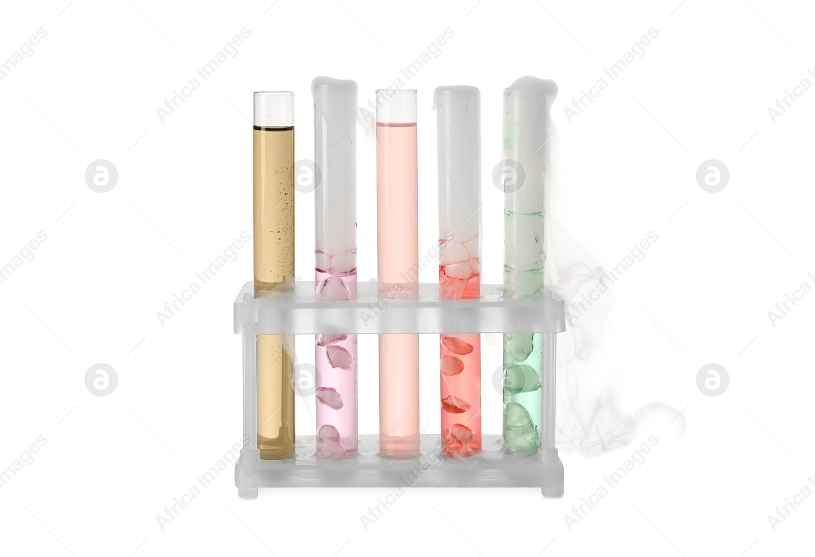 Photo of Test tubes with colorful liquids and steam isolated on white. Chemical reaction