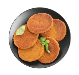 Photo of Delicious fried breaded cutlets with basil leaves isolated on white, top view