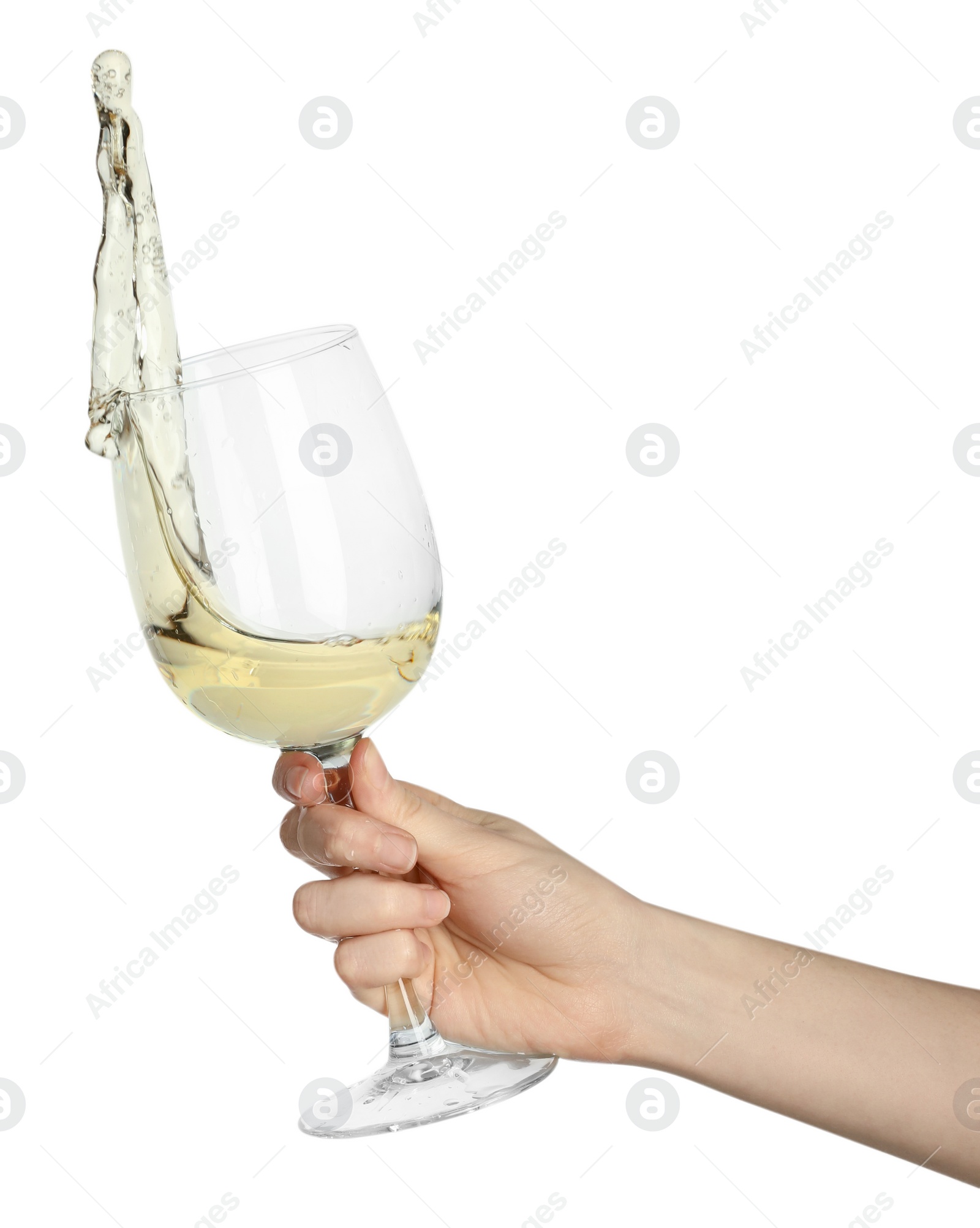 Photo of Woman with tasty aromatic wine splashing out of glass on white background, closeup