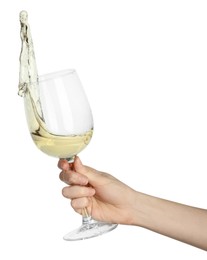 Woman with tasty aromatic wine splashing out of glass on white background, closeup