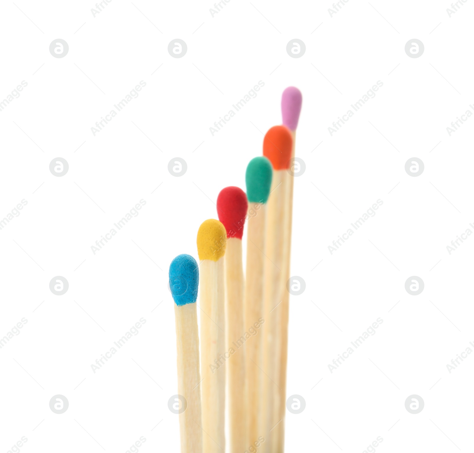 Photo of Matches with colorful heads on white background