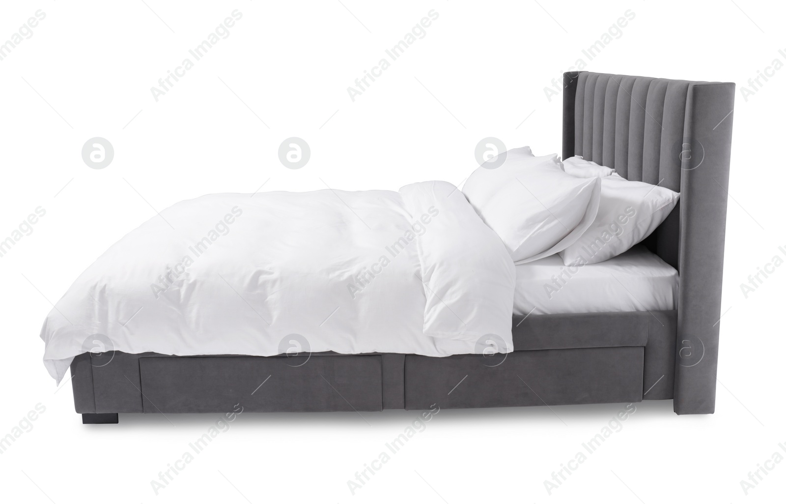 Photo of Comfortable gray bed with linens on white background