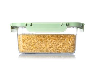 Photo of Box with uncooked millet on white background