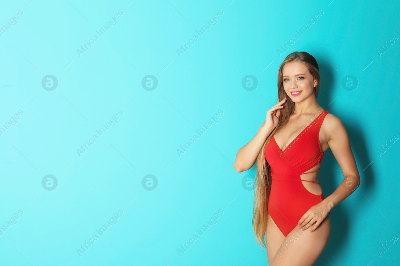 Photo of Beautiful woman wearing bikini on color background