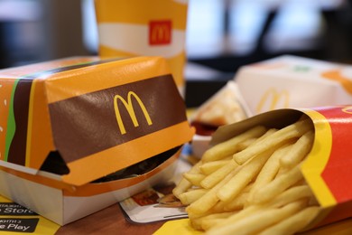 Photo of Lviv, Ukraine - October 9, 2023: McDonald's menu on table in restaurant, closeup