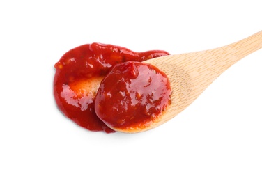 Photo of Wooden spoon and red sauce on white background, top view