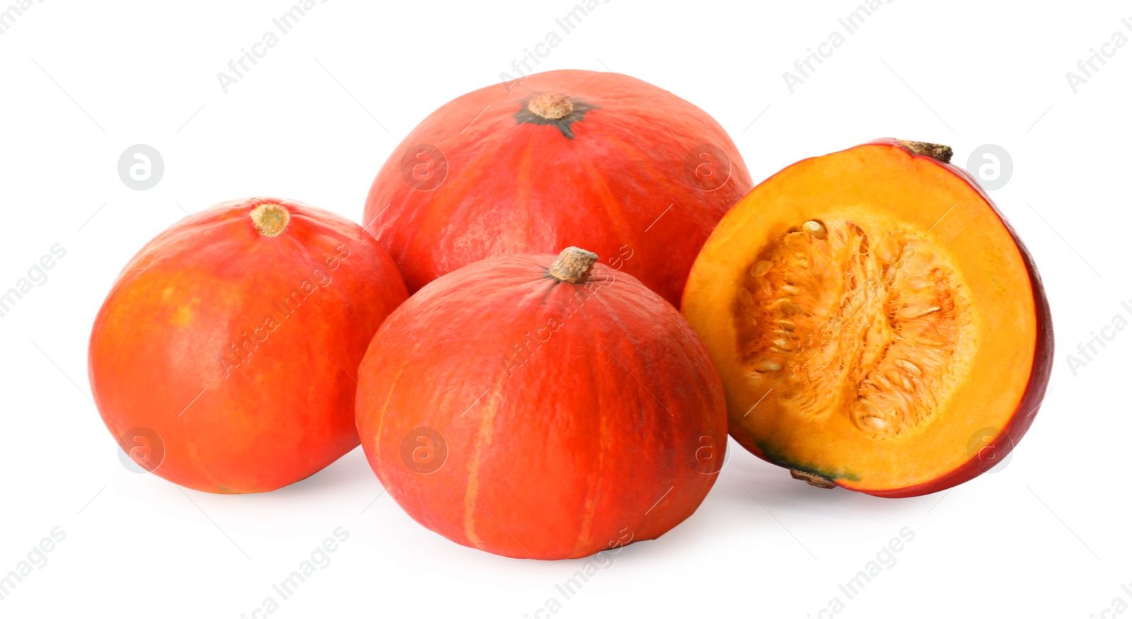 Photo of Many whole and cut ripe pumpkins on white background
