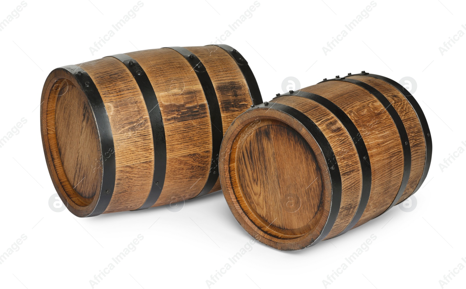 Photo of Two traditional wooden barrels on white background