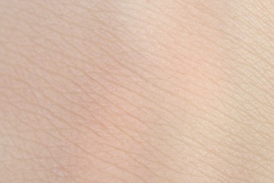 Photo of Texture of healthy skin as background, macro view