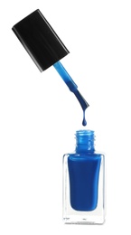 Photo of Brush over nail polish bottle on white background