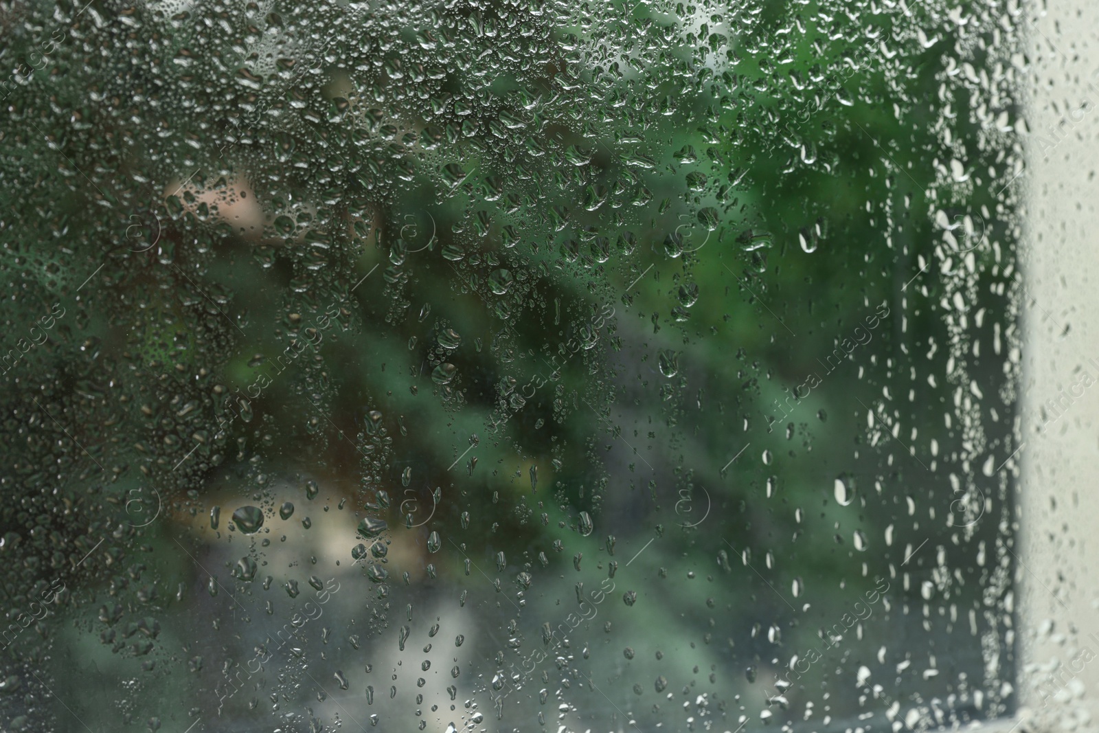 Photo of Window glass with water drops as background, closeup