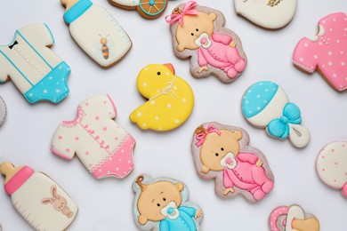 Set of baby shower cookies on light background, flat lay