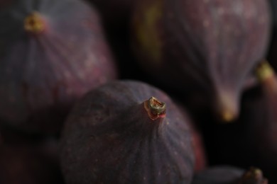 Photo of Tasty fresh figs as background, closeup view