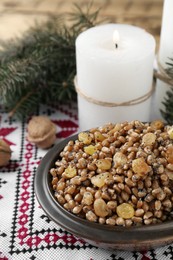 Photo of Traditional Christmas slavic dish kutia on rushnyk, closeup