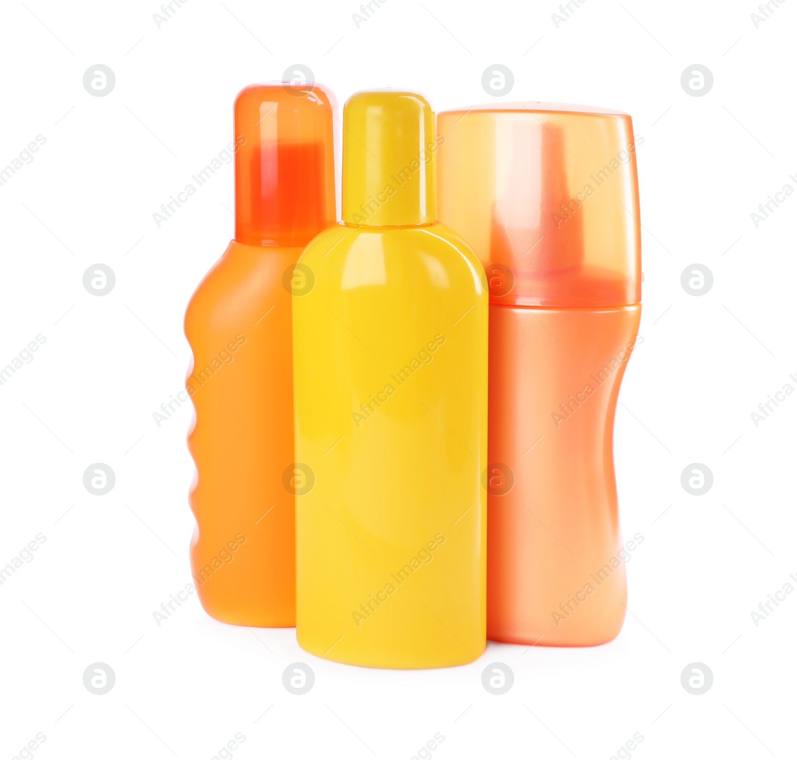 Photo of Bottles with sun protection products isolated on white