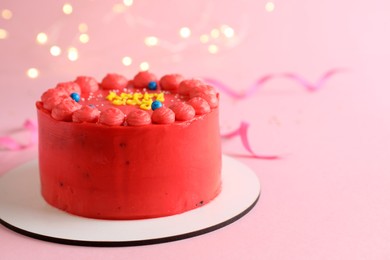 Photo of Cute bento cake with tasty cream on pink background, space for text