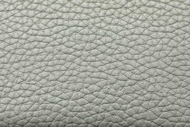 Photo of Texture of grey leather as background, closeup