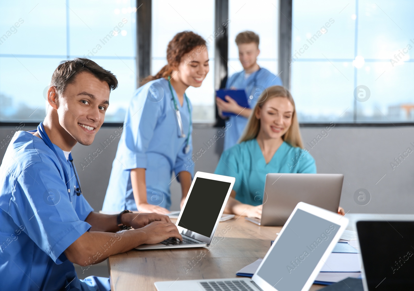 Photo of Medical student with his classmates in college
