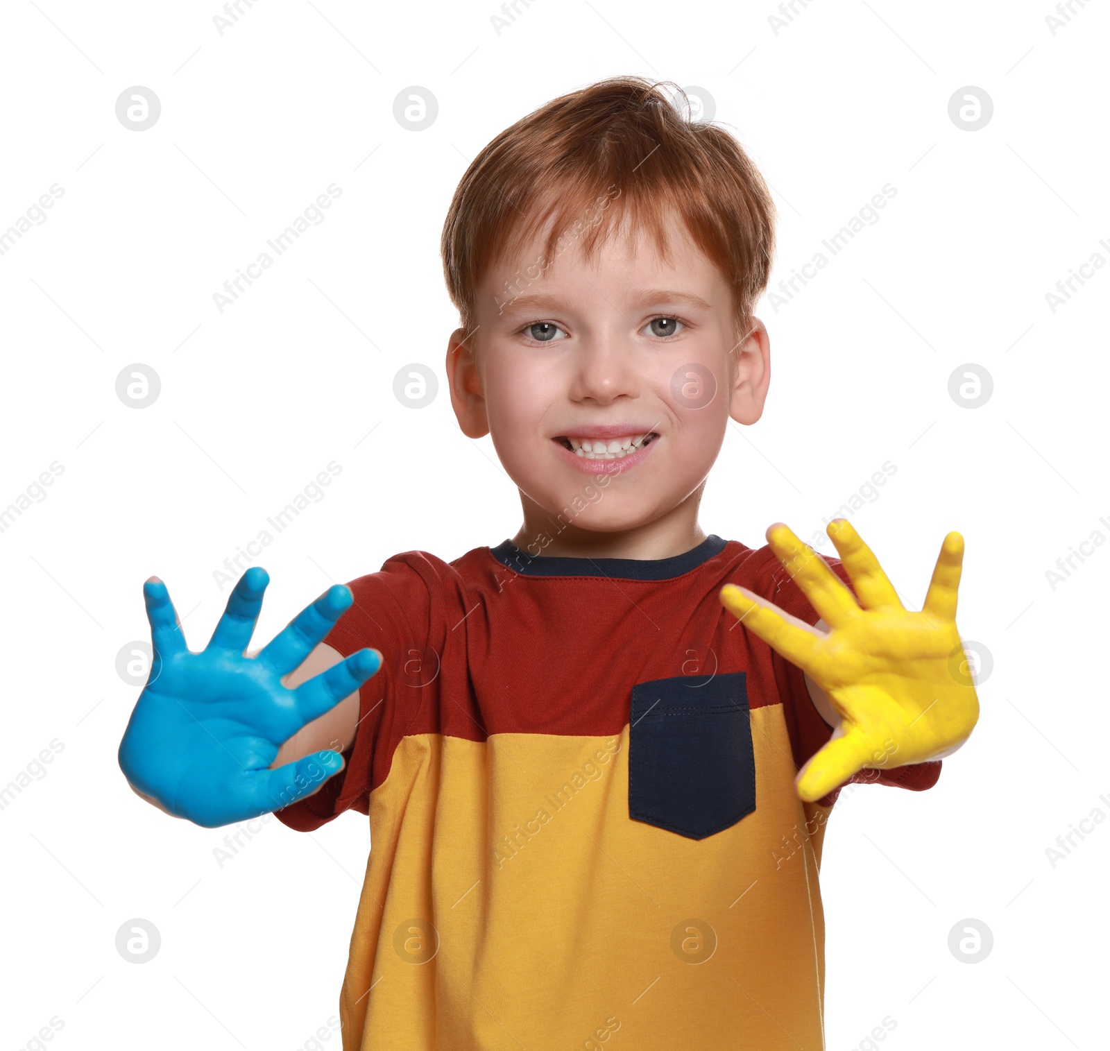 Photo of Little boy with hands painted in Ukrainian flag colors on white background. Love Ukraine concept