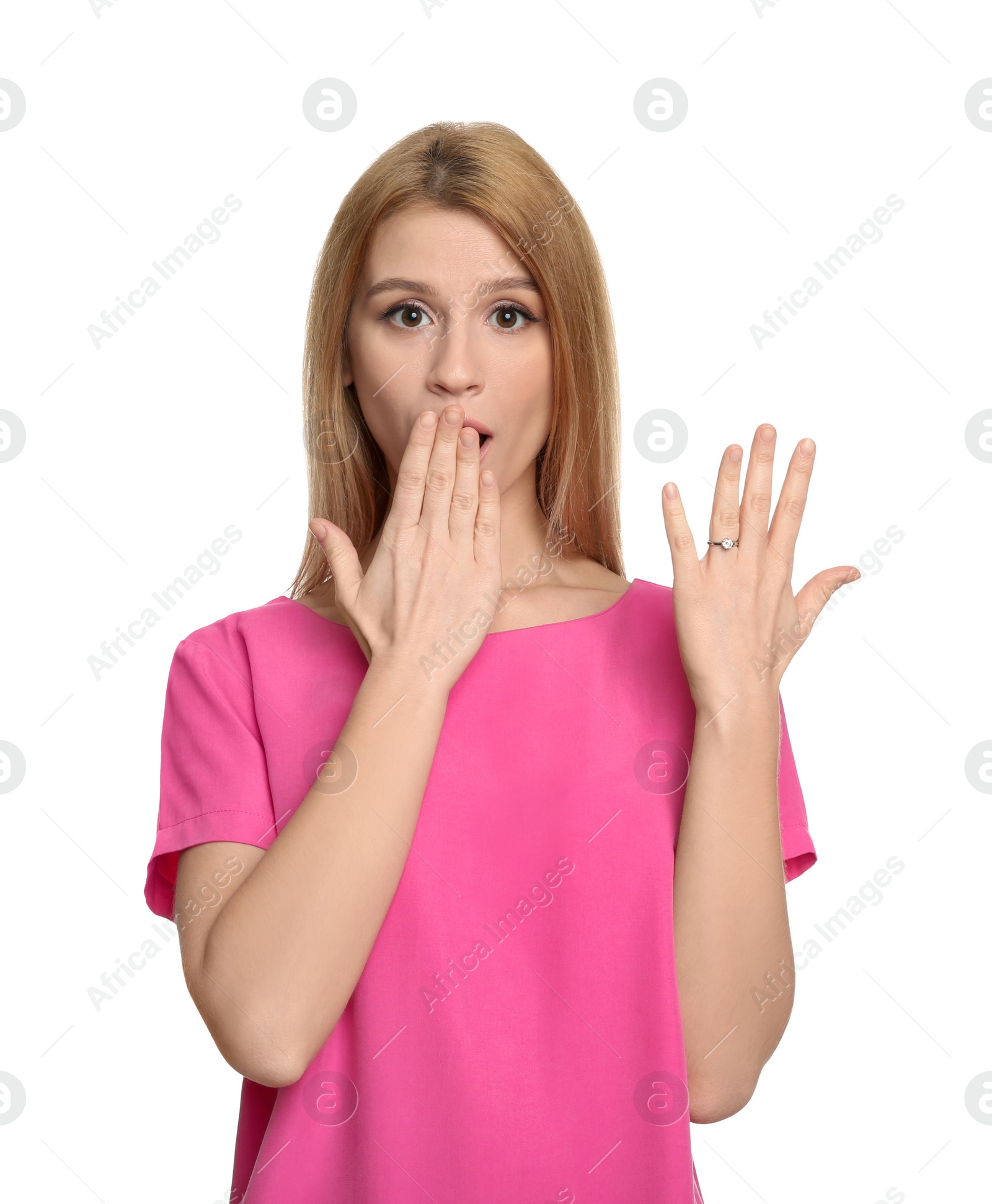 Photo of Emotional woman with engagement ring on white background