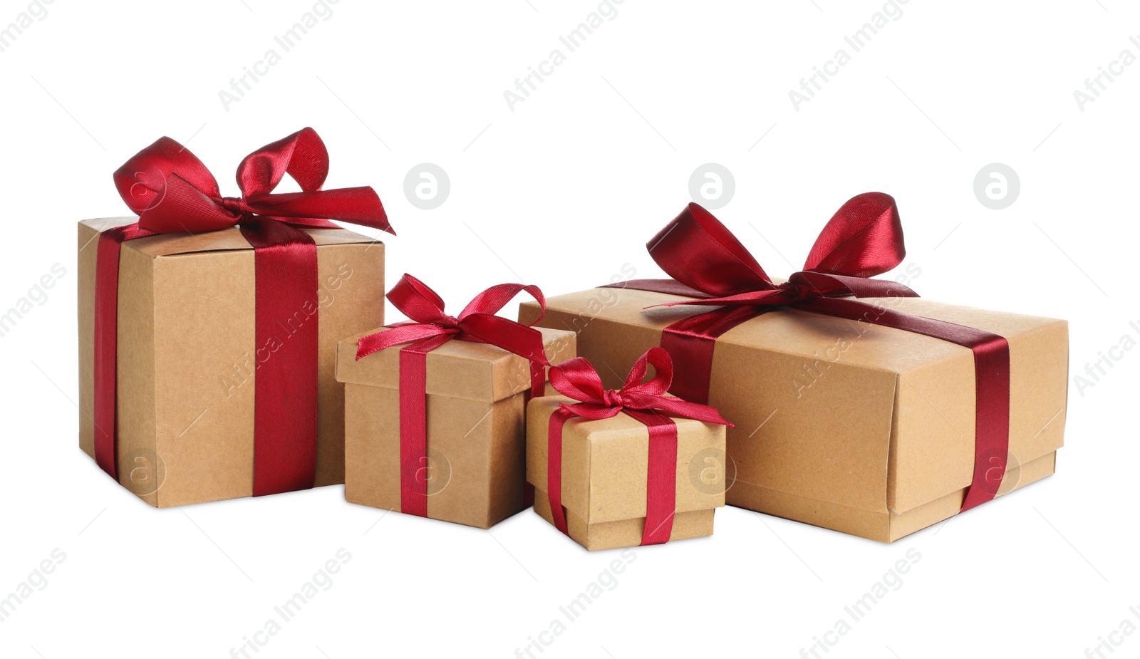 Photo of Christmas gift. Kraft boxes on white background