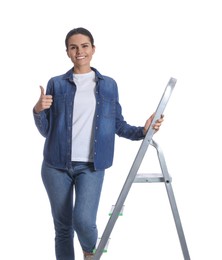 Photo of Young woman on metal ladder against white background