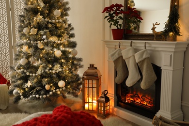 Fireplace in beautiful living room decorated for Christmas