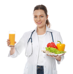 Nutritionist with glass of juice and healthy products on white background